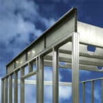 Image of a RIM BEAM&trade; by Metwood Building Solutions sitting on top of a steel framed wall with a beautiful clear blue sky in the background.
