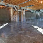 Image of a basement with framing using the Metwood TUFF BEAM&trade; Structural CFS Beam to allow wide open space.